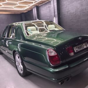 Green Bentley rear angle after detailing