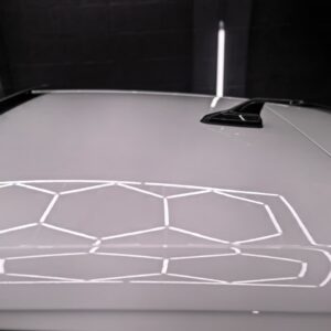 White Volkswagen roof reflection after detailing