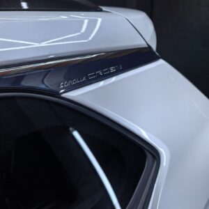 White Toyota SUV rear spoiler and roof detail