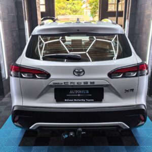 White Toyota SUV rear view after detailing