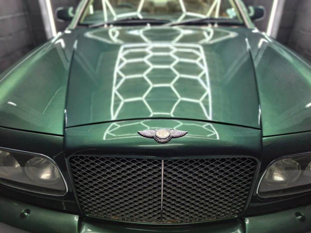 Ceramic Coating showing green Bentley at AutoHub in Observatory, Cape Town
