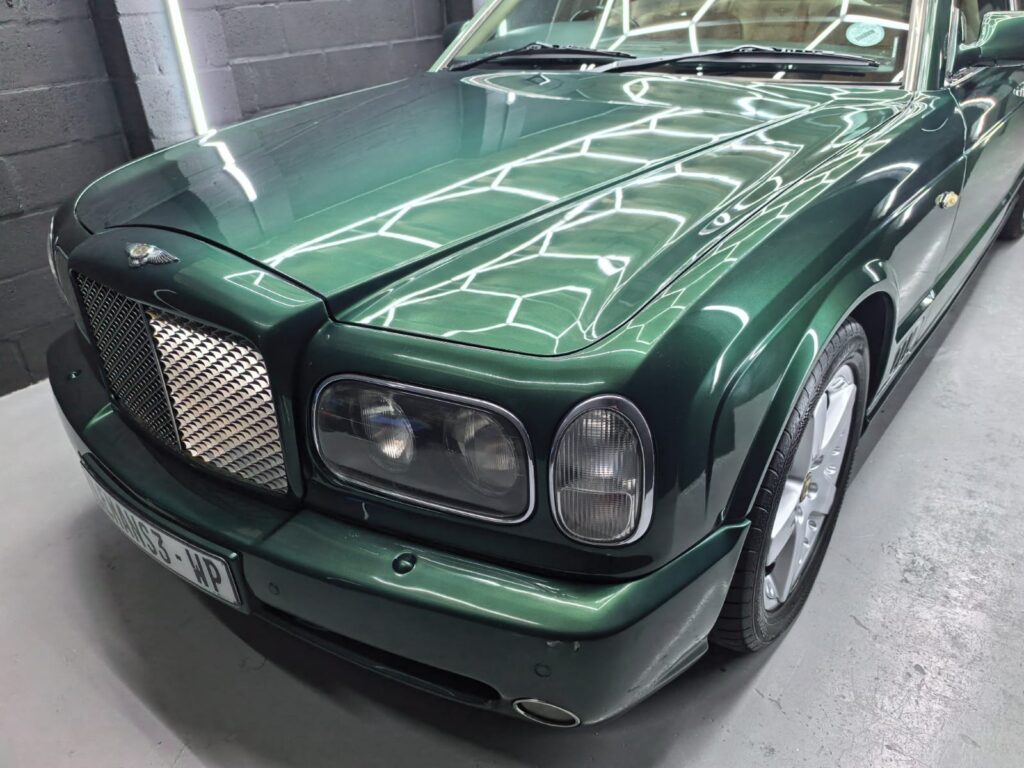 Ceramic Coating showing green Bentley at AutoHub in Observatory, Cape Town
