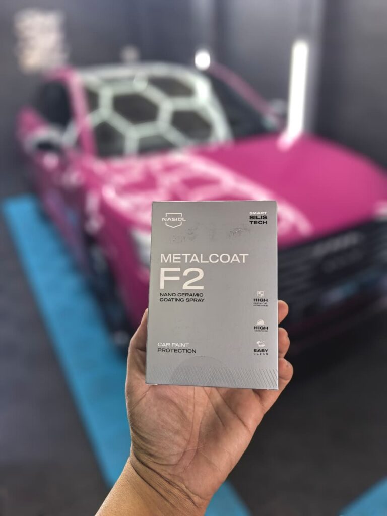 Metalcoat F2 ceramic coating package with a pink Audi SUV at AutoHub