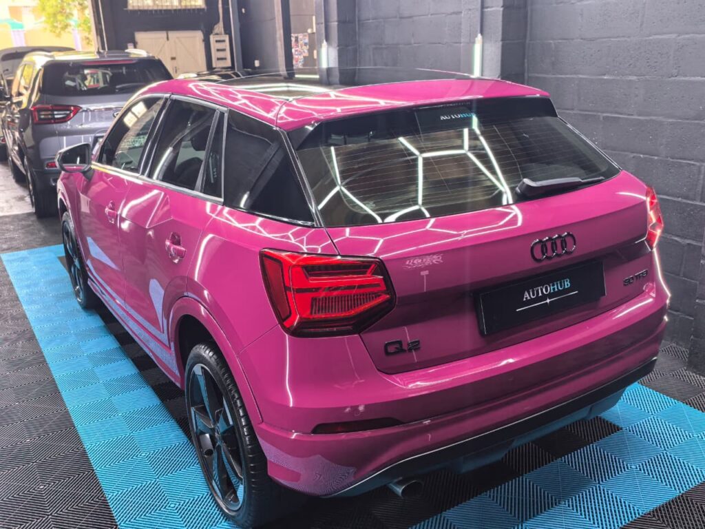 Ceramic Coating showing pink Audi SUV at AutoHub in Observatory, Cape Town
