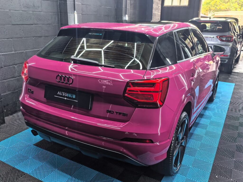 Ceramic Coating showing pink Audi SUV at AutoHub in Observatory, Cape Town