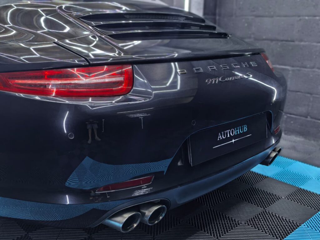 Vehicle Detailing showing black Porsche at AutoHub in Observatory, Cape Town