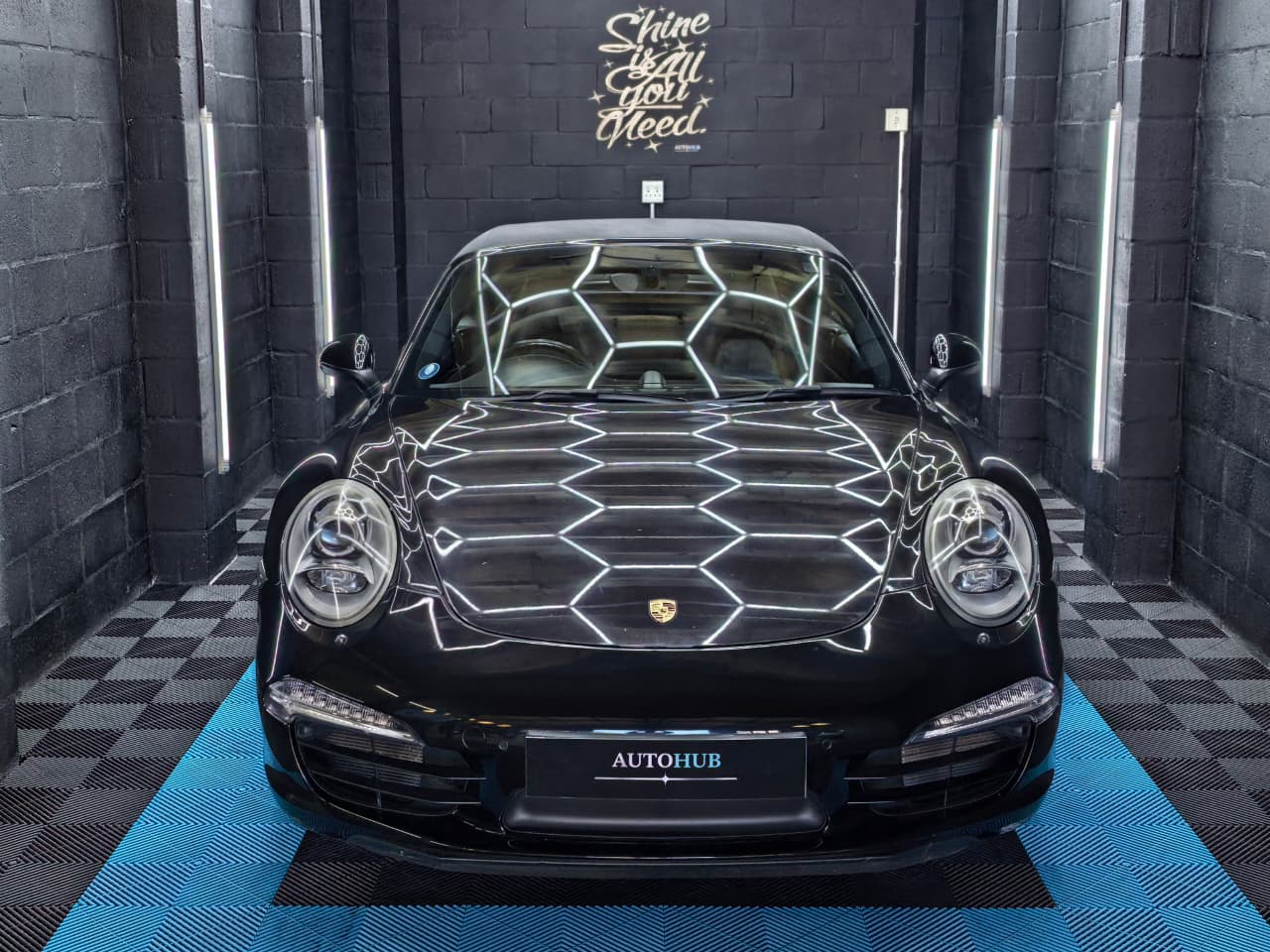 Vehicle Detailing showing black Porsche at AutoHub in Observatory, Cape Town