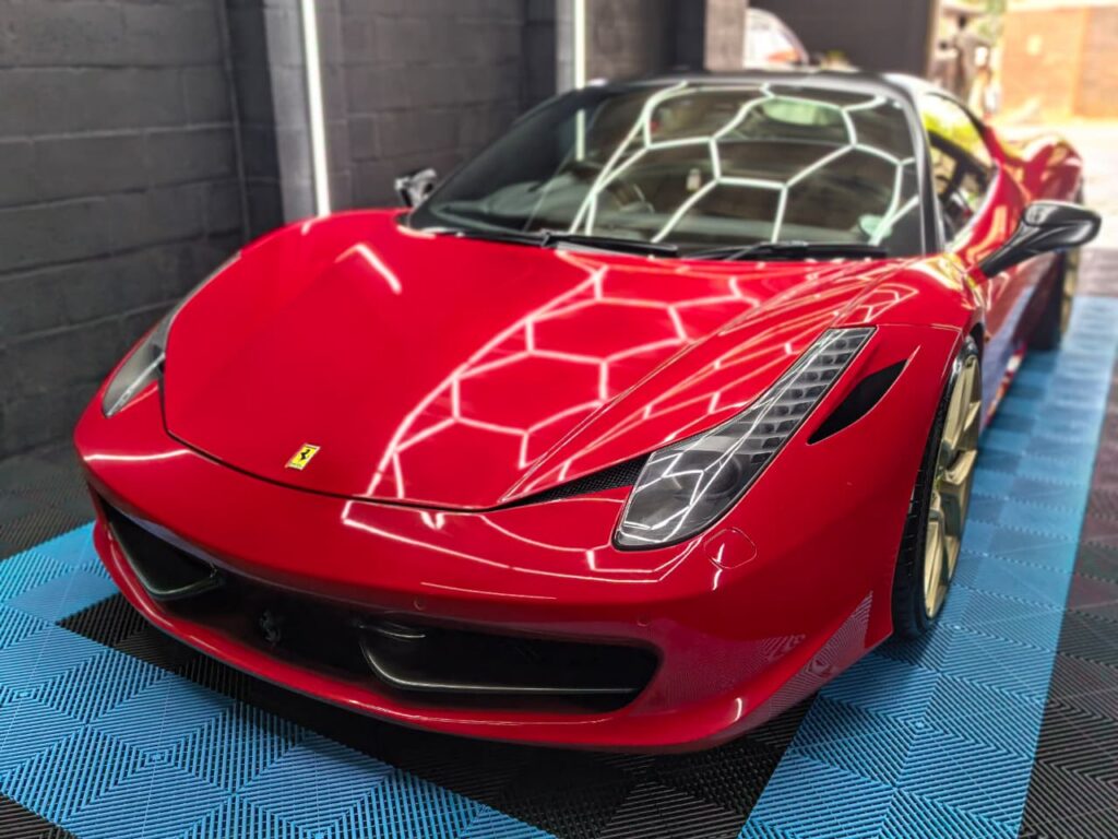 Vehicle Detailing showing red Ferrari at AutoHub in Observatory, Cape Town