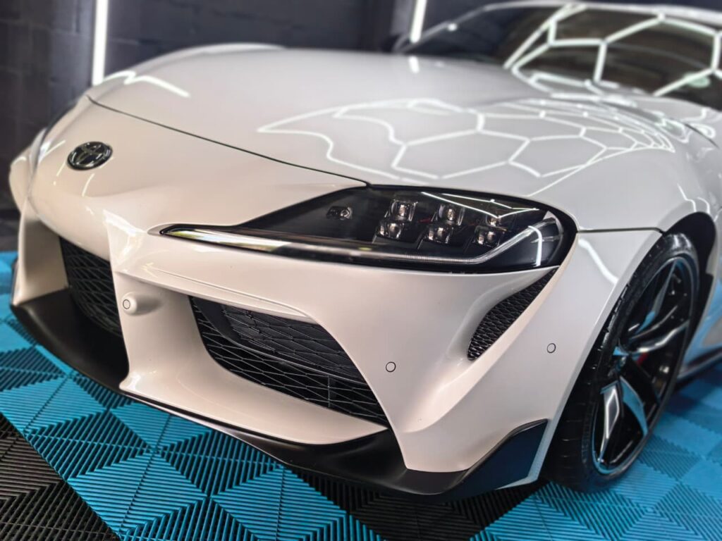 Vehicle Detailing showing white Toyota Supra at AutoHub in Observatory, Cape Town