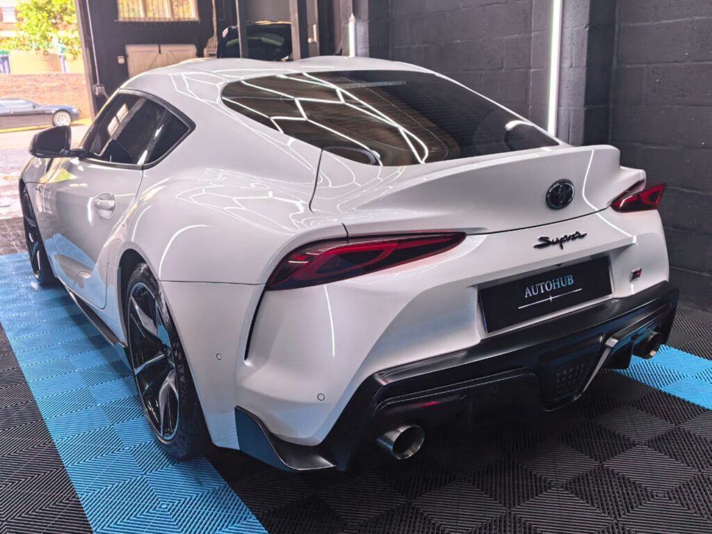 Vehicle Detailing showing white Toyota Supra at AutoHub in Observatory, Cape Town