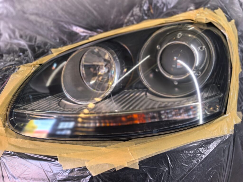 Headlight Restoration showing Porsche headlight at AutoHub in Observatory, Cape Town