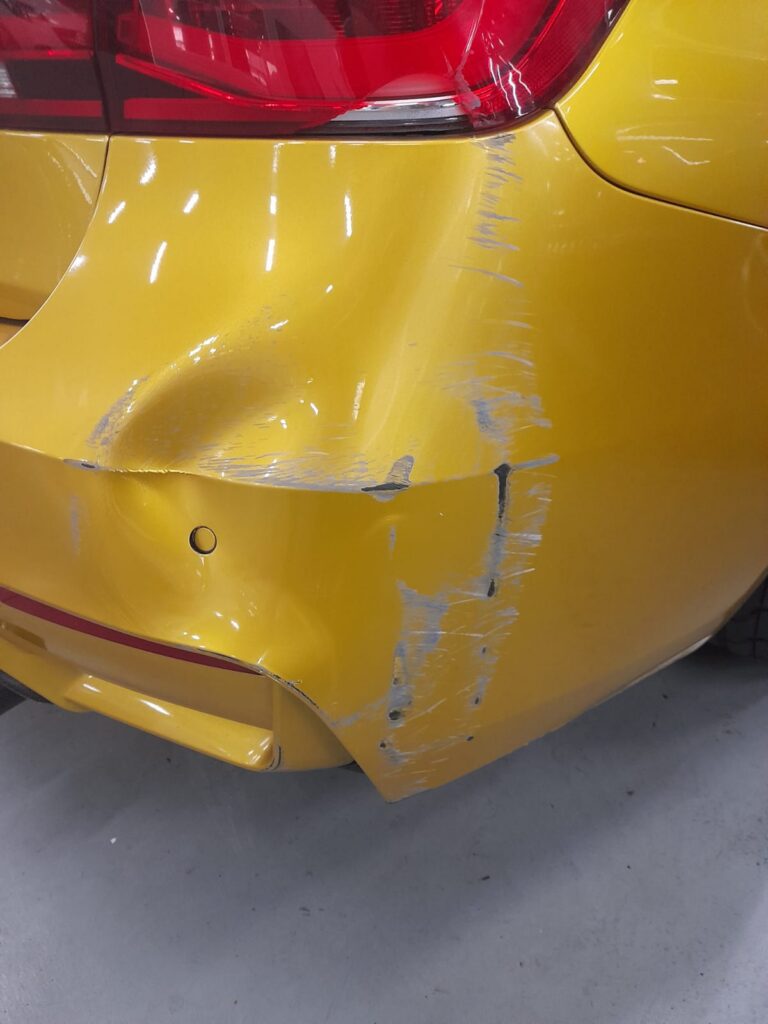 Body Repair showing yellow vehicle bumper at AutoHub in Observatory, Cape Town